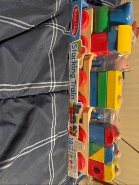 Melissa & Doug Wooden Stacking Train in Red, Blue, Green, Yellow